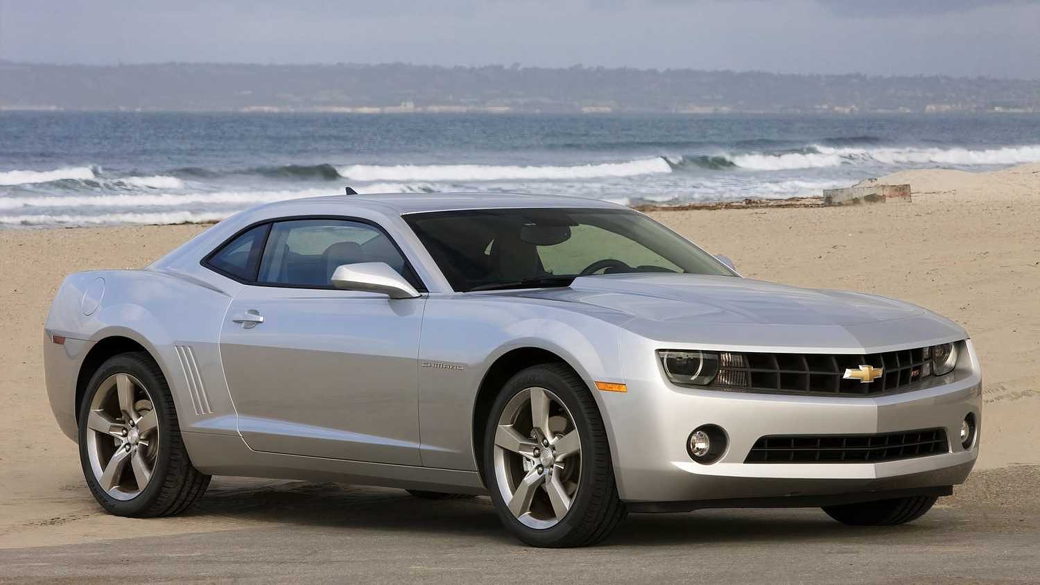 A 2011 Chevrolet Camaro, three-quarter front